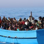 Les migrants dans leur embarcation